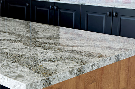 A grey quartz countertop in a kitchen